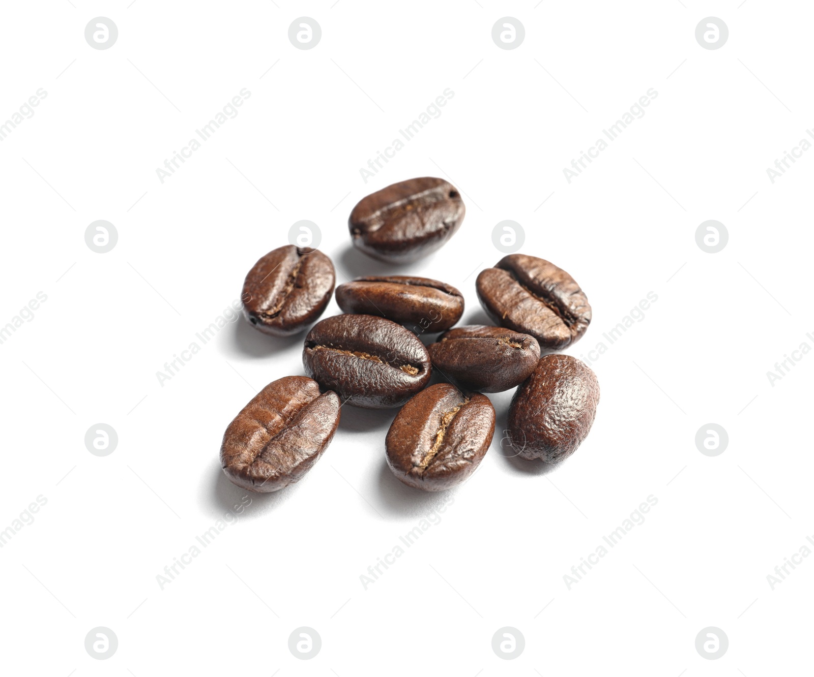 Photo of Pile of roasted coffee beans on white background