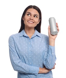 Beautiful young woman holding tin can with beverage on white background