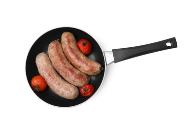 Photo of Frying pan with tasty homemade sausages and tomatoes isolated on white, top view