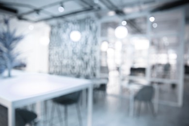 Image of Office interior. Blurred view of comfortable workspace