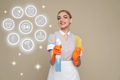 Young chambermaid and different icons on beige background