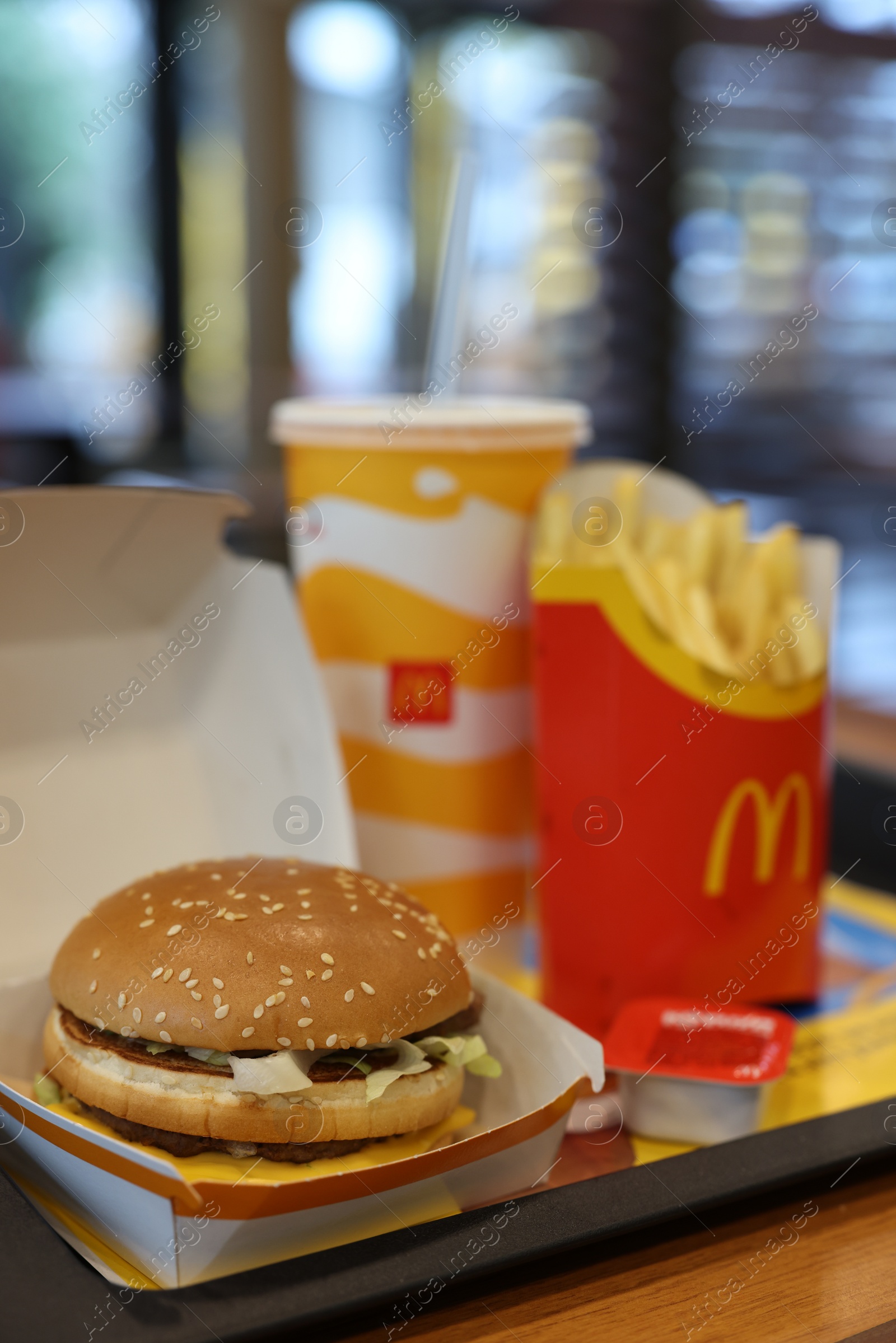 Photo of Lviv, Ukraine - October 9, 2023: McDonald's menu on table in restaurant, closeup