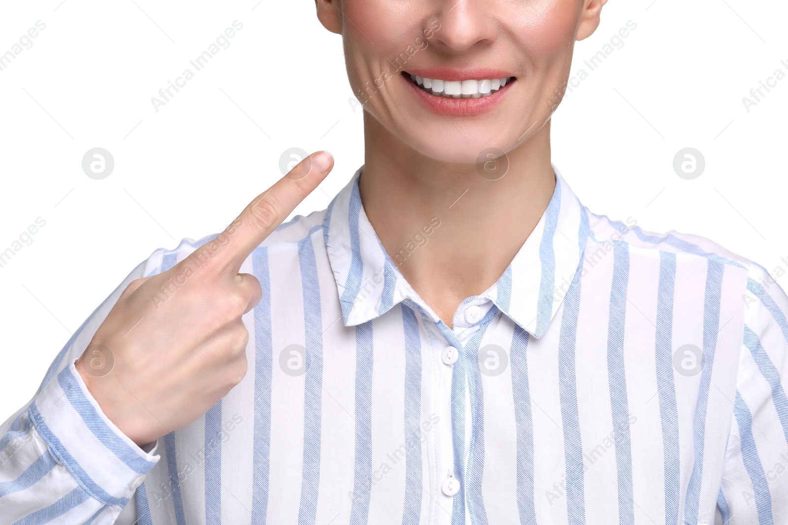 Photo of Woman showing her clean teeth and smiling on white background, closeup