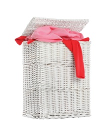 Photo of Wicker laundry basket with dirty clothes on white background