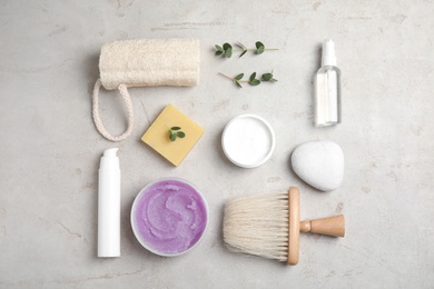 Flat lay composition with different body care products on grey background