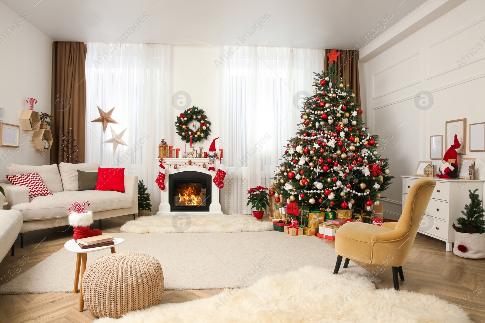 Photo of Festive living room interior with Christmas tree near fireplace