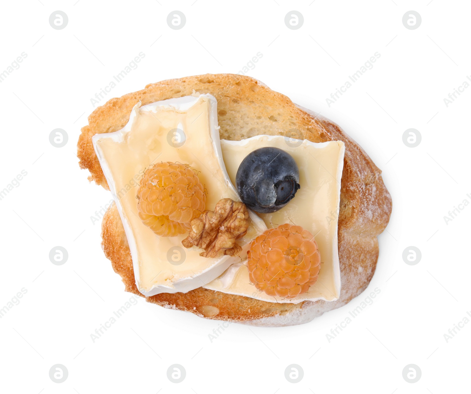Photo of Tasty sandwich with brie cheese, fresh berries and walnut isolated on white, top view