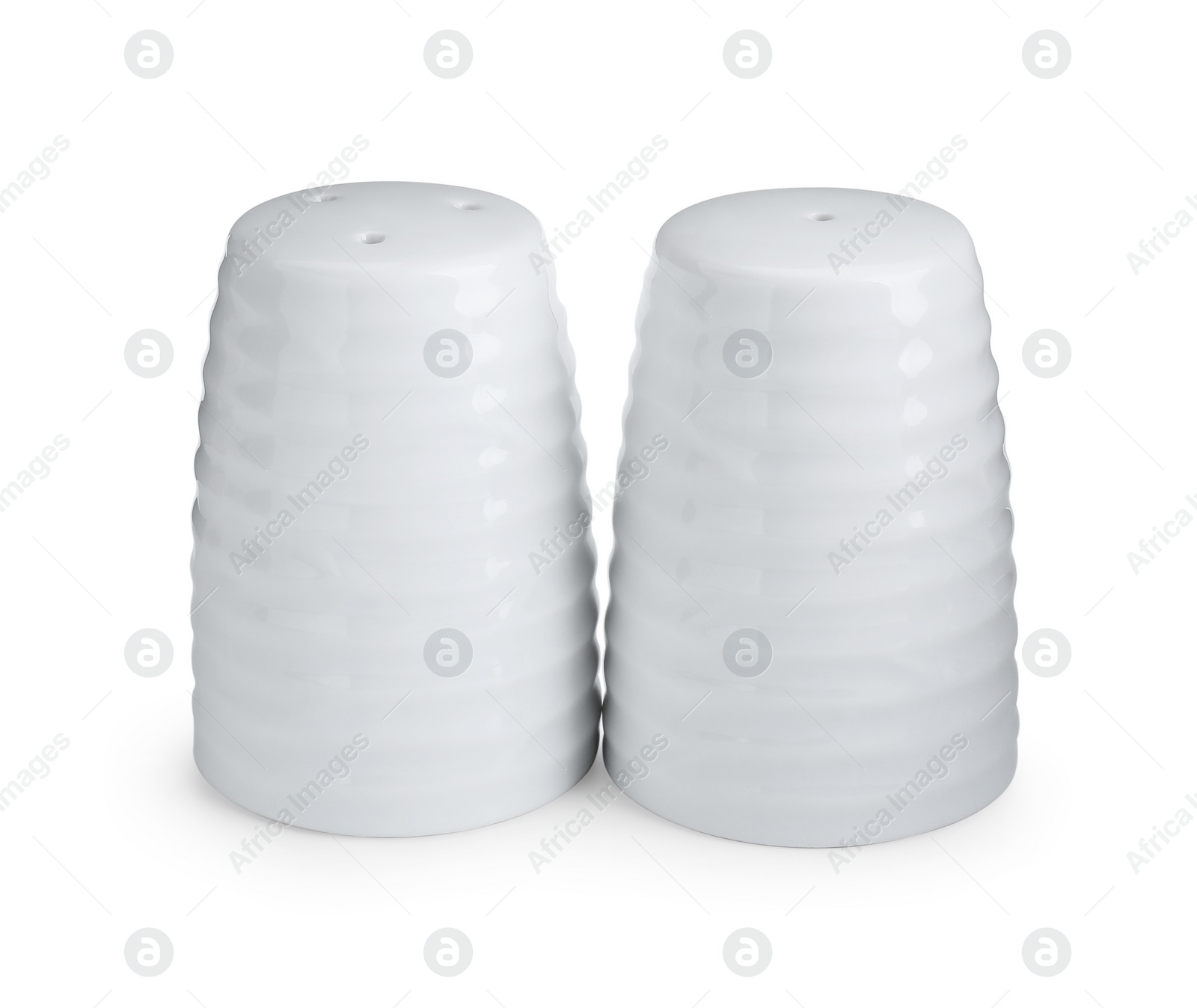 Photo of Salt and pepper shakers isolated on white