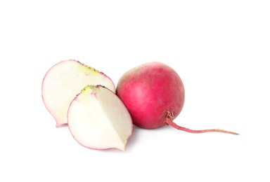 Cut and whole fresh ripe turnips on white background