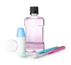 Items for teeth care and personal hygiene on white background