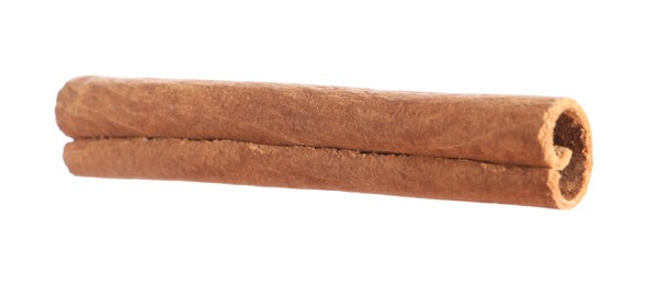 Photo of One aromatic cinnamon stick isolated on white