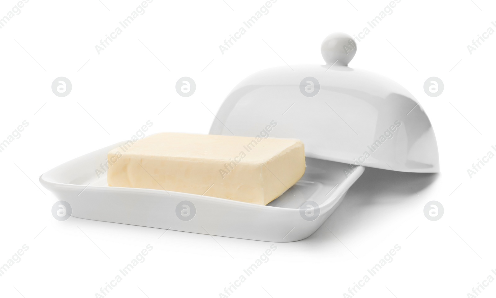 Photo of Dish with tasty fresh butter on white background