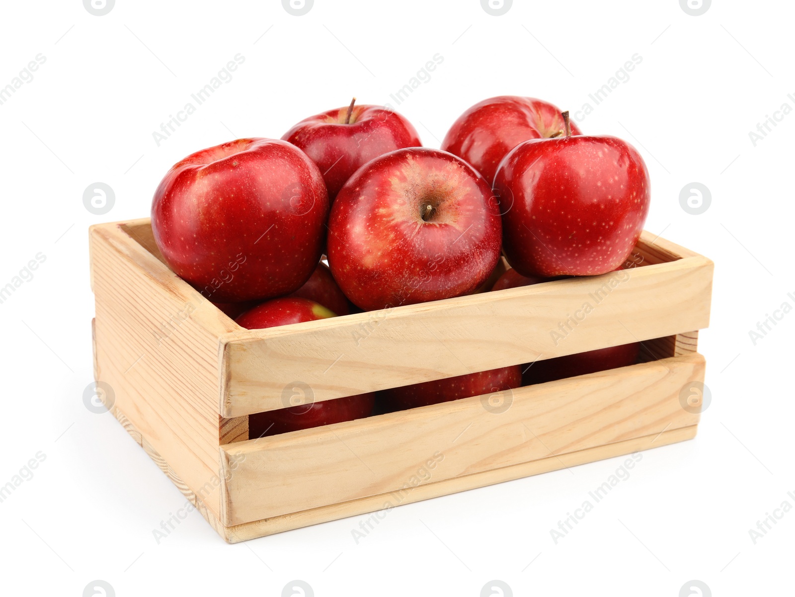 Photo of Wooden crate of ripe juicy red apples on white background