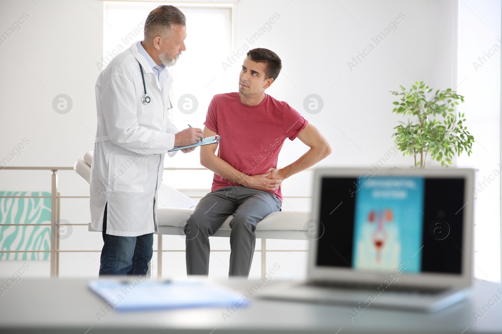 Photo of Man with health problem visiting urologist at hospital