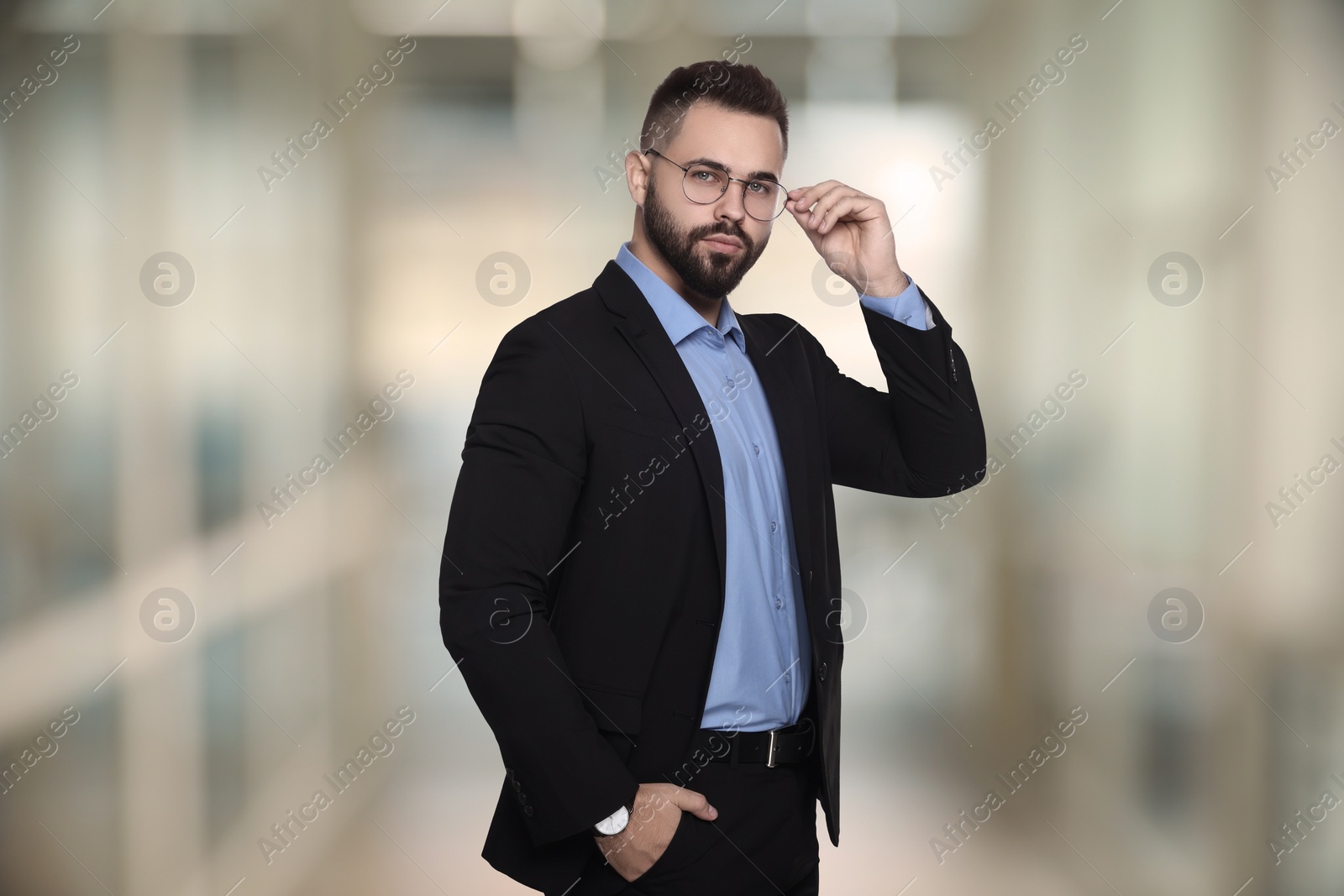 Image of Successful lawyer in glasses on blurred background