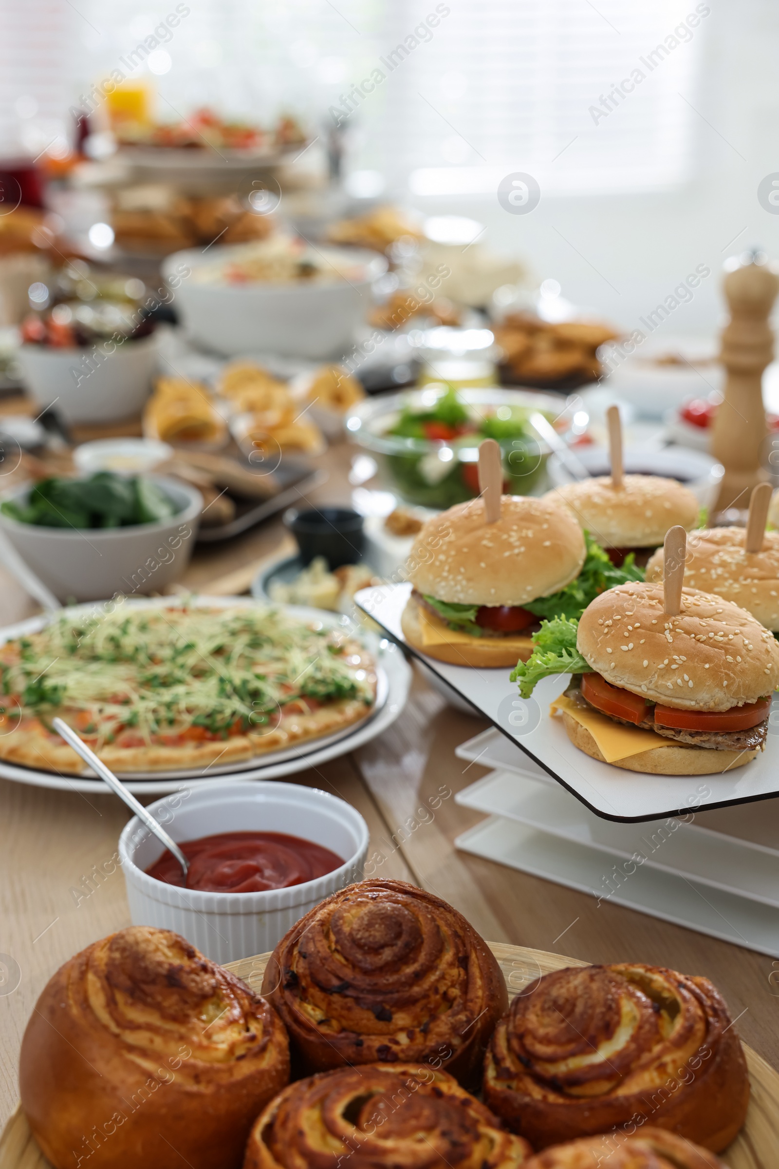 Photo of Brunch table setting with different delicious food indoors