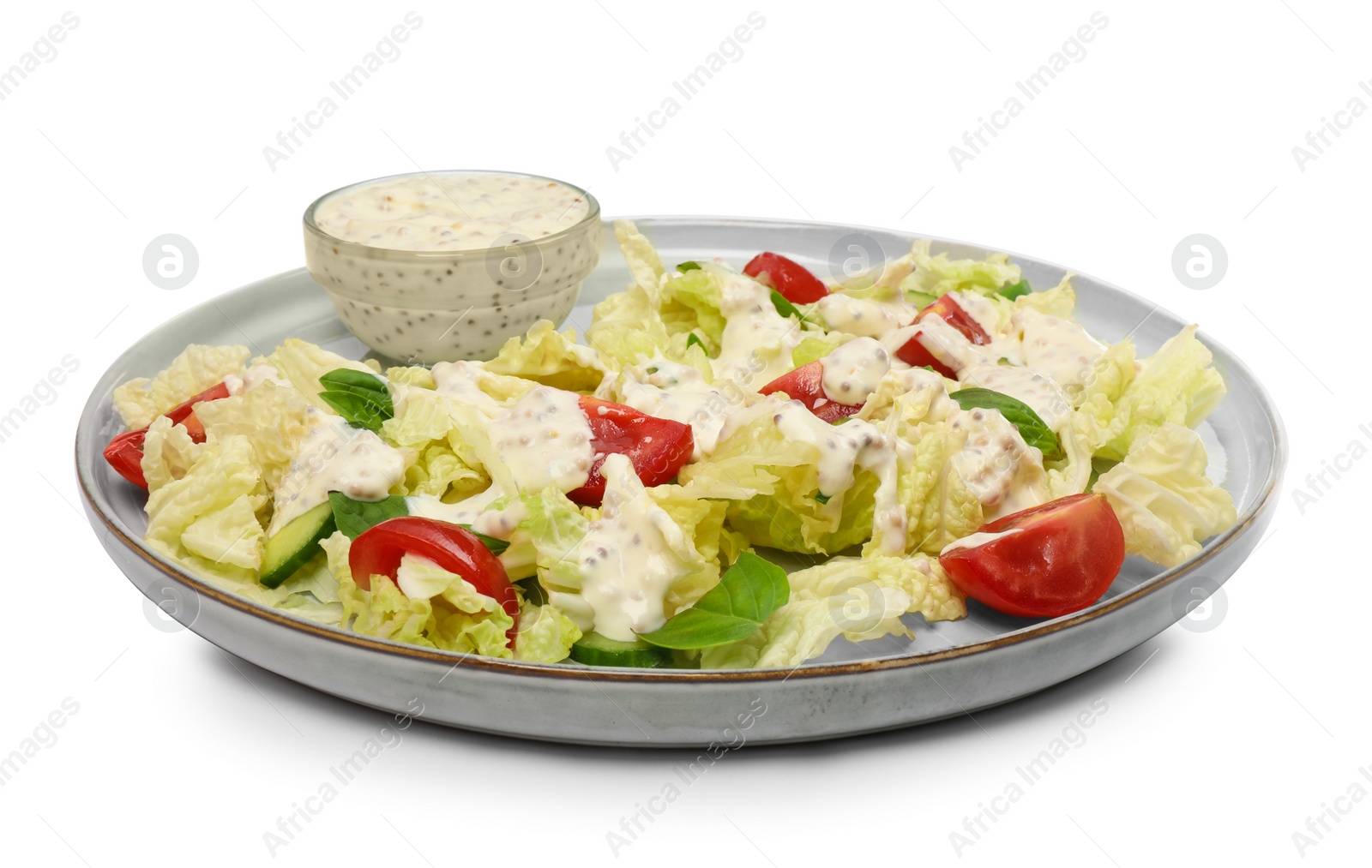 Photo of Delicious salad with Chinese cabbage, tomatoes, cucumber and dressing isolated on white