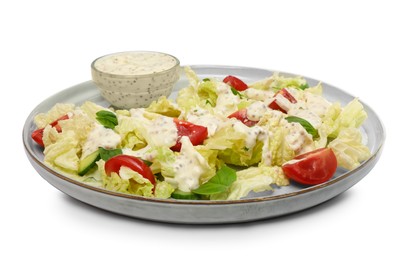 Delicious salad with Chinese cabbage, tomatoes, cucumber and dressing isolated on white