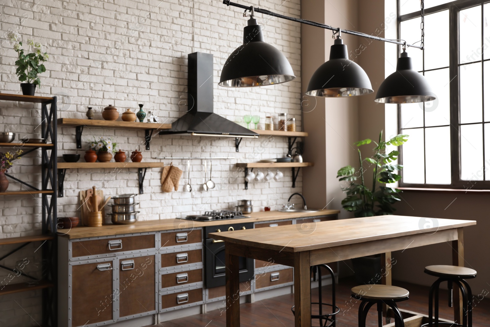 Photo of Beautiful kitchen interior with new stylish furniture