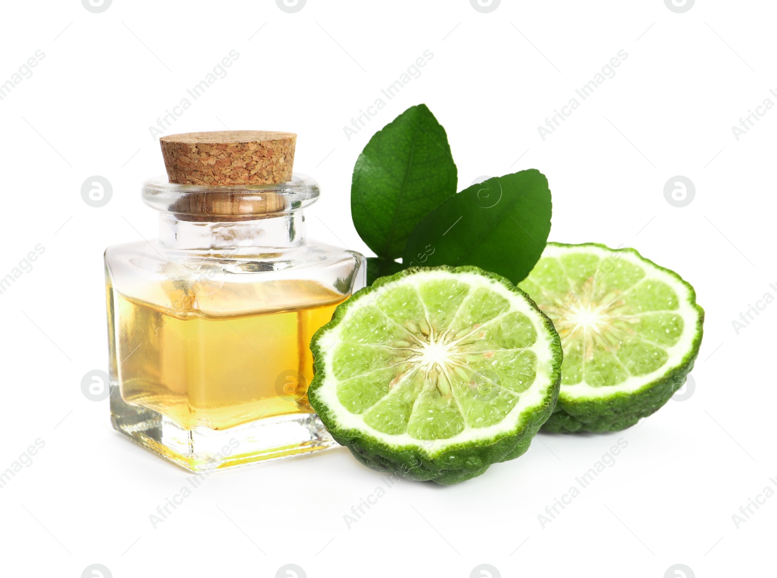 Photo of Bottle of essential oil, fresh bergamot fruit and leaves on white background
