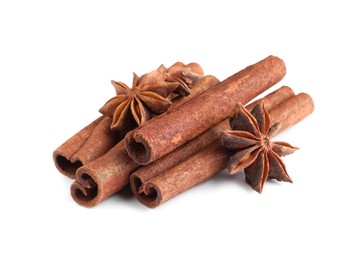 Cinnamon sticks and anise stars isolated on white