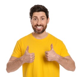 Photo of Happy man showing thumbs up on white background