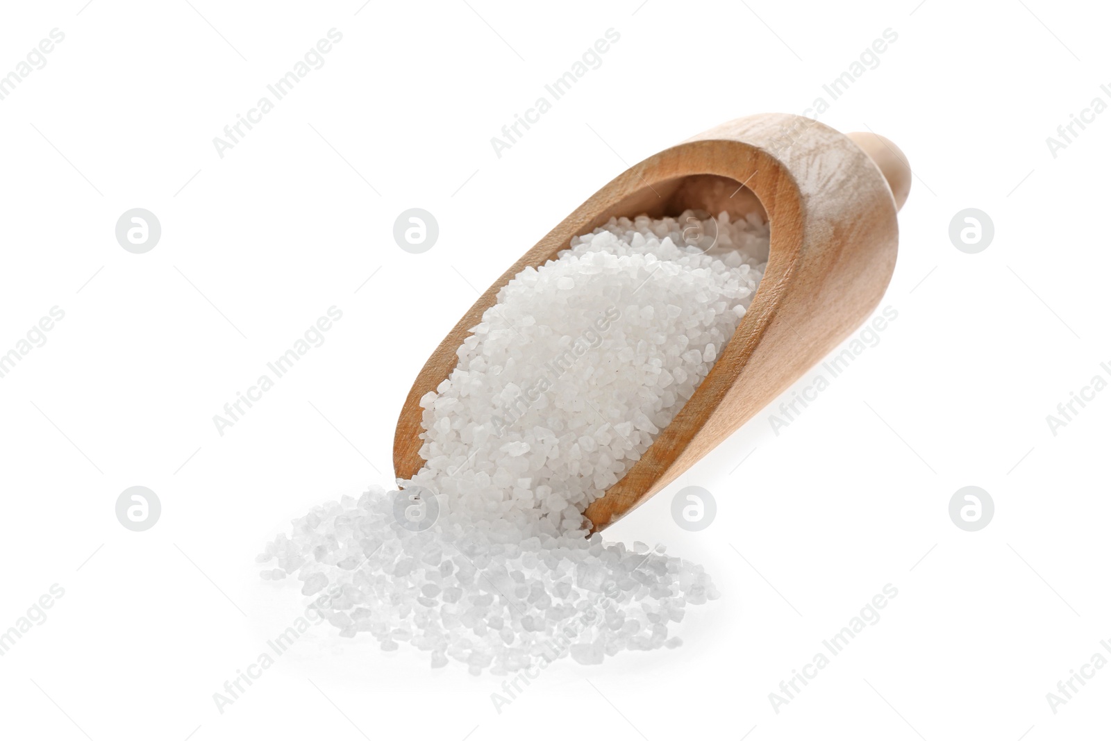 Photo of Wooden scoop with salt isolated on white