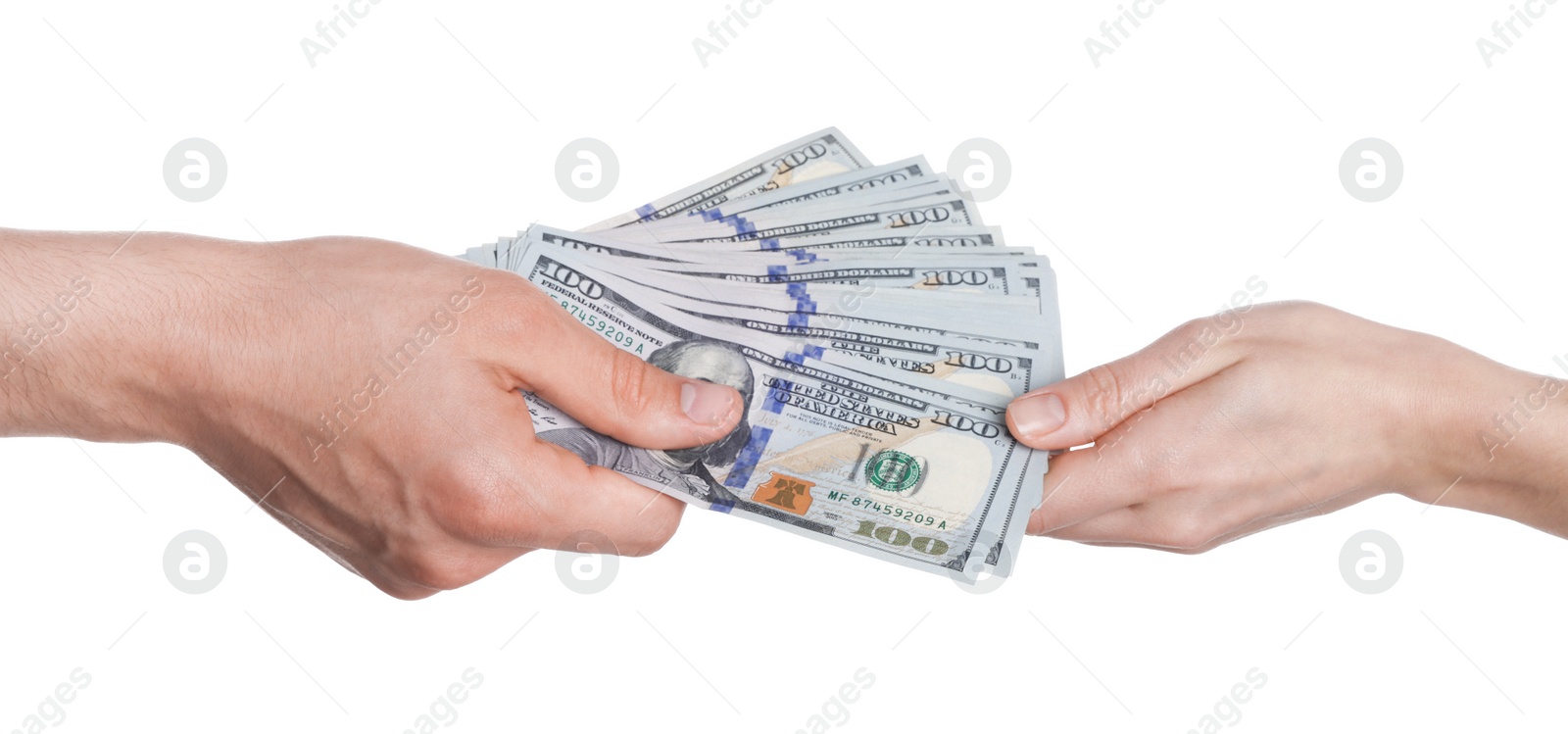 Photo of Money exchange. Man giving dollar banknotes to woman on white background, closeup