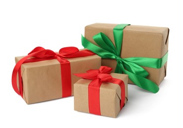 Photo of Different beautifully wrapped gift boxes on white background