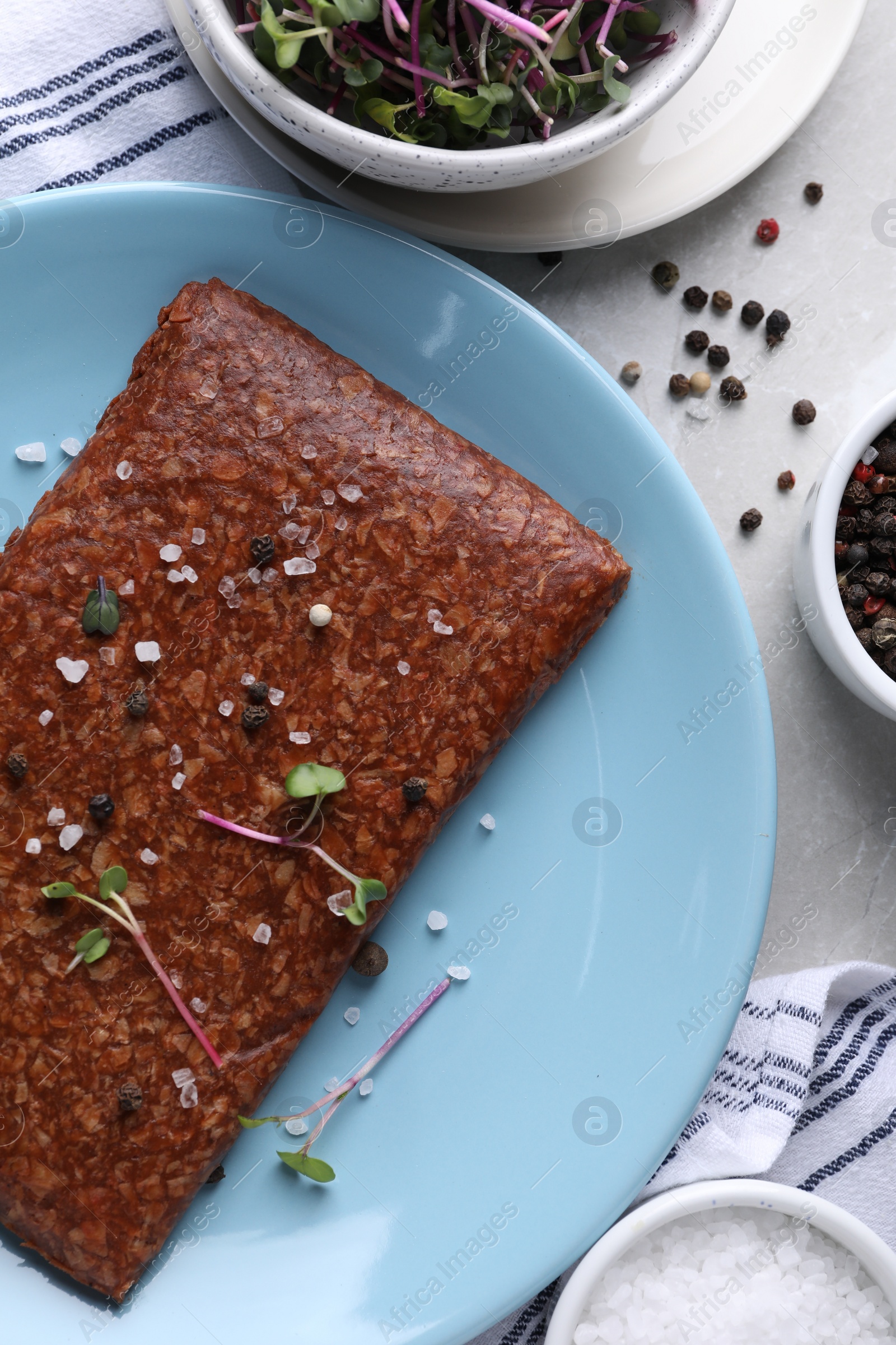 Photo of Fresh raw vegan mince and spices on white table, flat lay