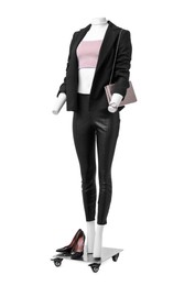 Female mannequin dressed in black suit and crop top with accessories isolated on white. Stylish outfit