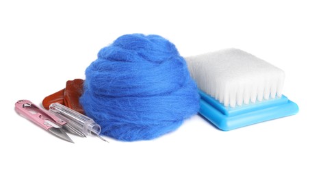 Blue wool and needle felting tools isolated on white