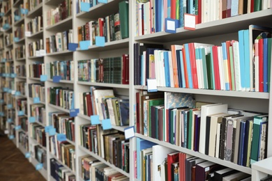 View of shelves with books in library