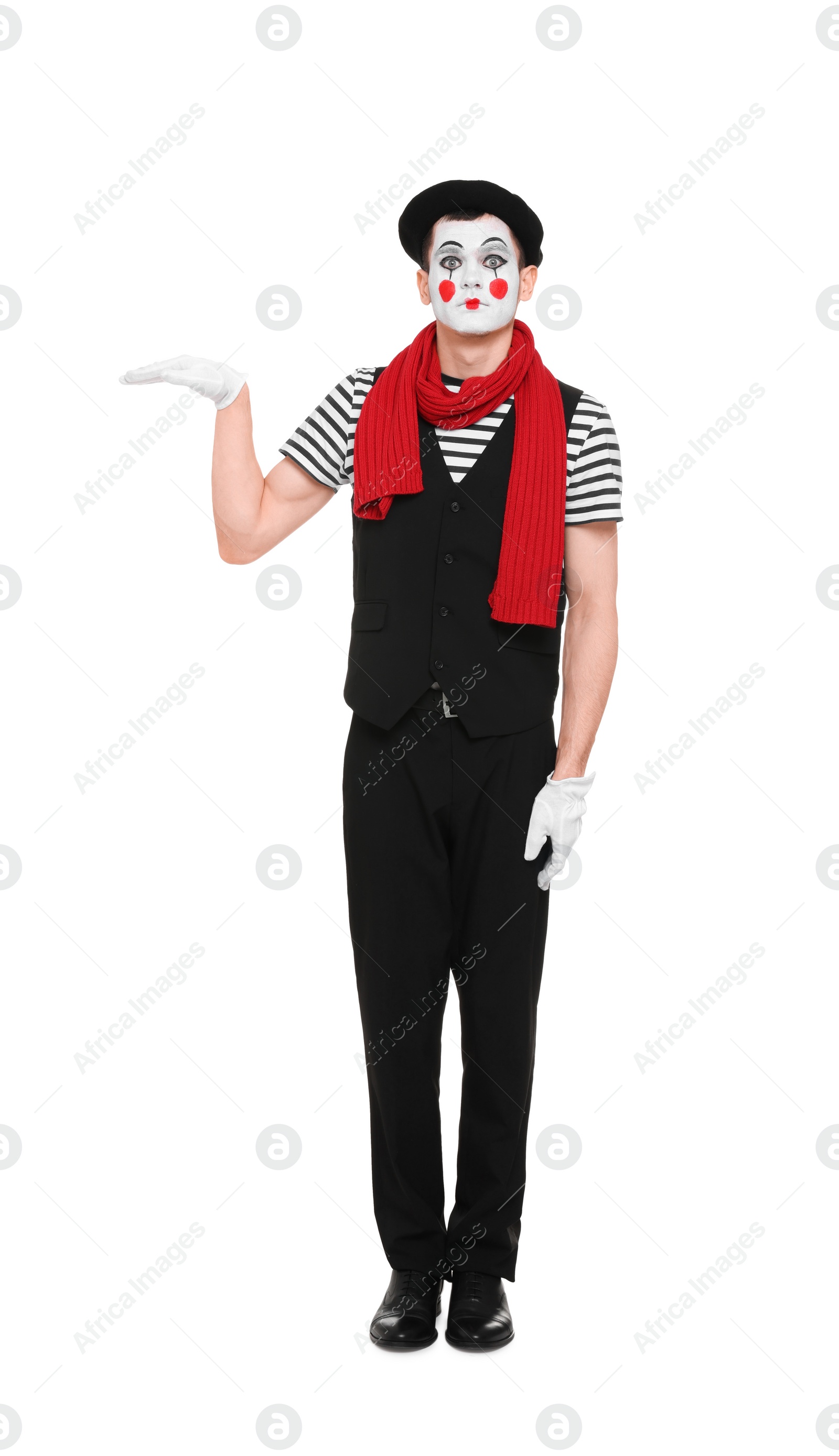 Photo of Funny mime artist in beret posing on white background