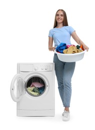 Photo of Beautiful young woman with laundry near washing machine on white background