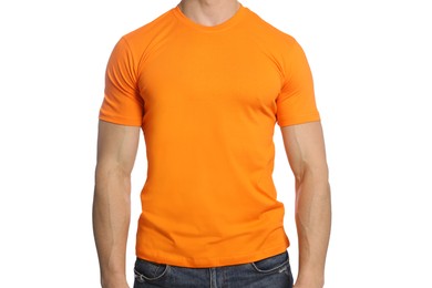 Man wearing orange t-shirt on white background, closeup. Mockup for design