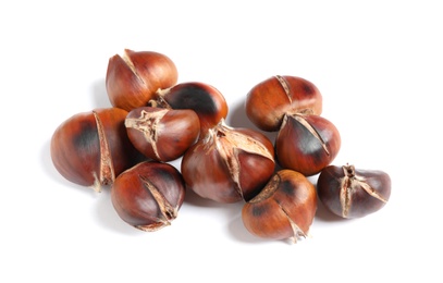 Photo of Delicious sweet roasted edible chestnuts isolated on white