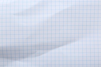 Photo of Checkered notebook sheet as background, top view