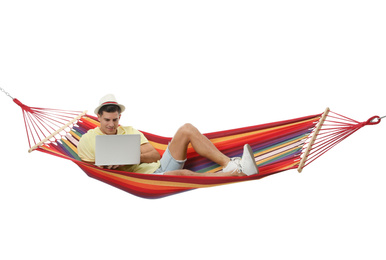 Photo of Man with laptop in hammock on white background