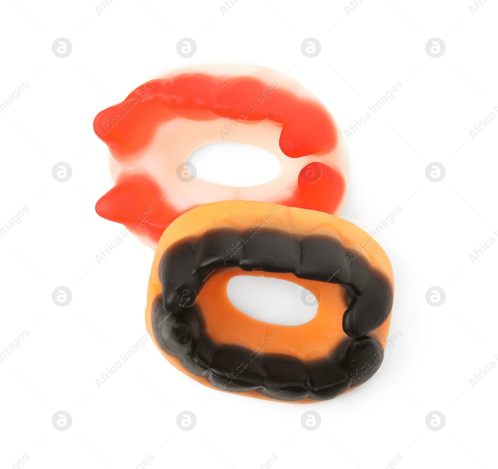 Photo of Delicious colorful candies on white background, top view. Halloween sweets