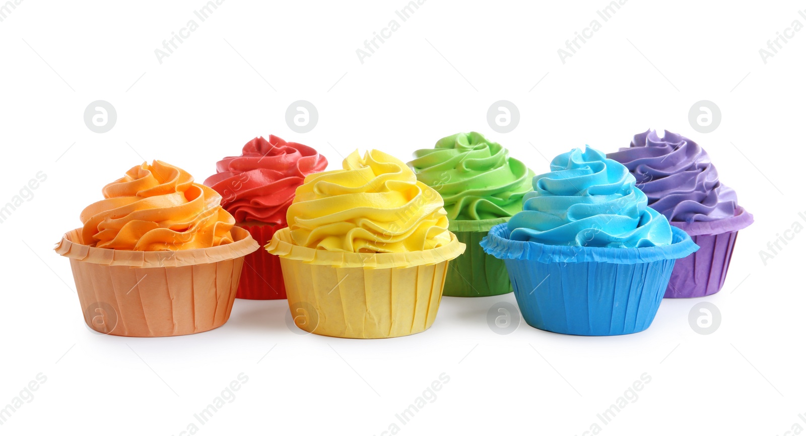 Photo of Tasty cupcakes with bright cream isolated on white