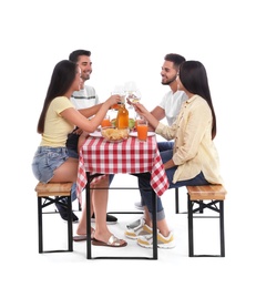 Photo of Group of friends at picnic table against white background