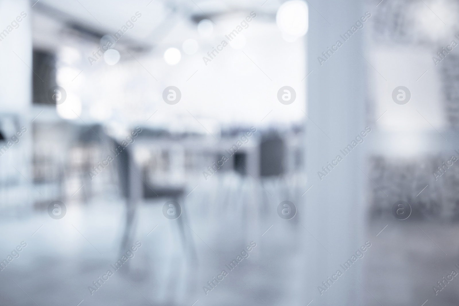 Image of Office interior. Blurred view of comfortable workspace