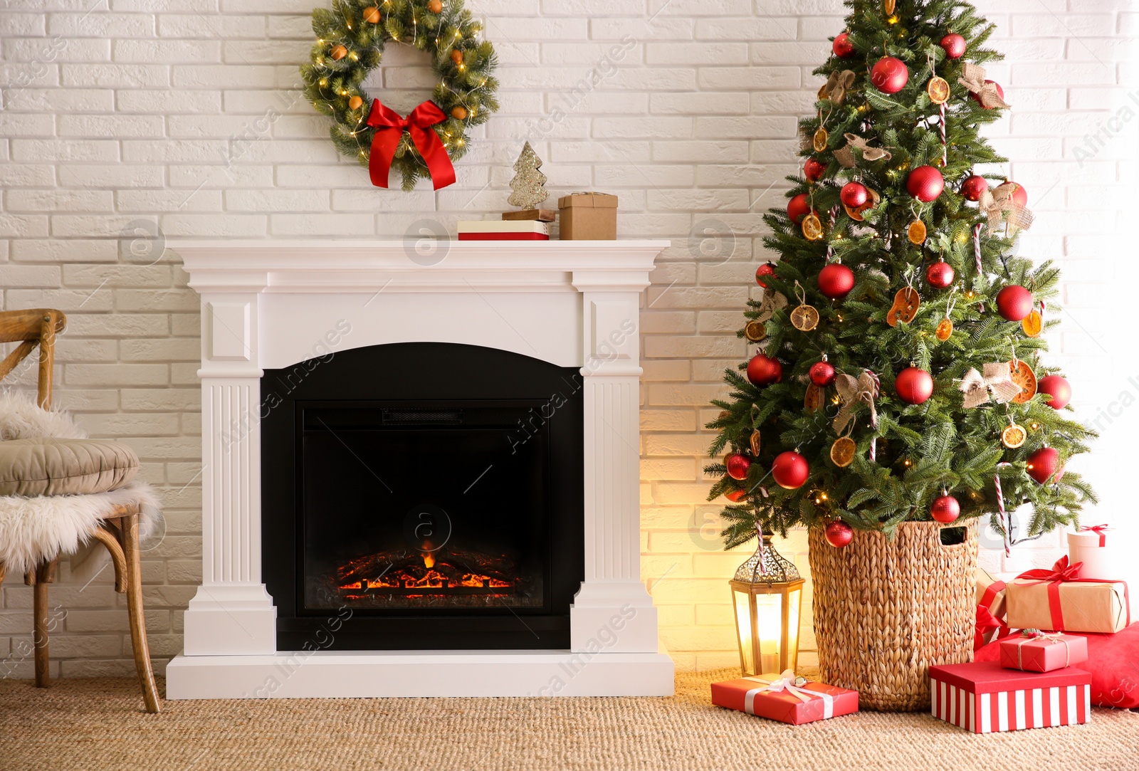 Photo of Beautiful living room interior with decorated Christmas tree and modern fireplace