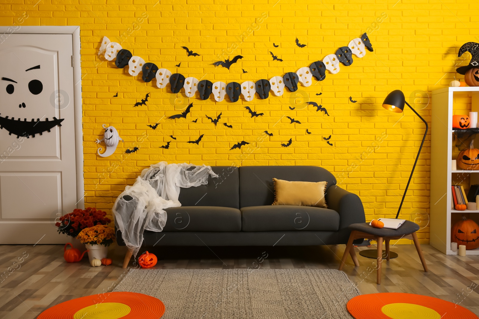 Photo of Modern room decorated for Halloween. Festive interior