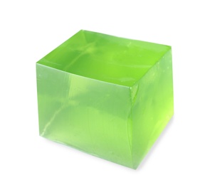 Delicious green jelly cube on white background