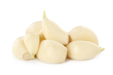 Photo of Peeled cloves of fresh garlic isolated on white