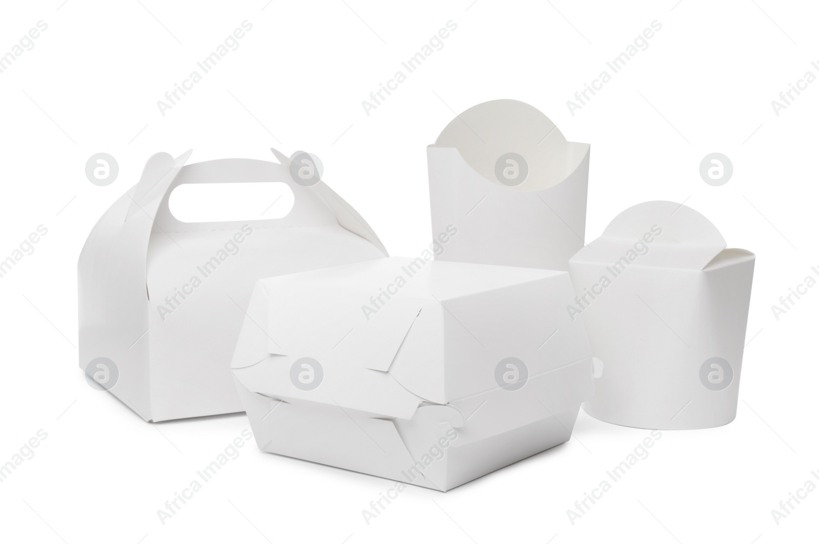 Photo of Set of different paper containers for food on white background