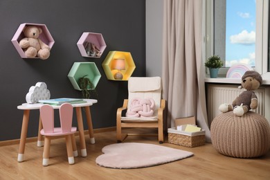 Child's room interior with table and different toys