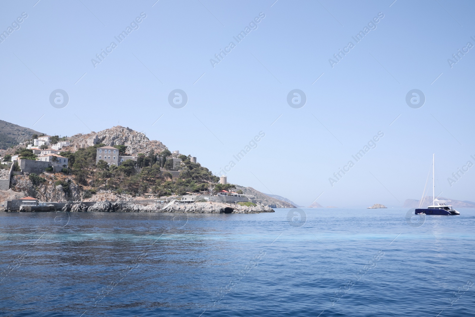 Photo of Beautiful view of sea with boat and coastal city